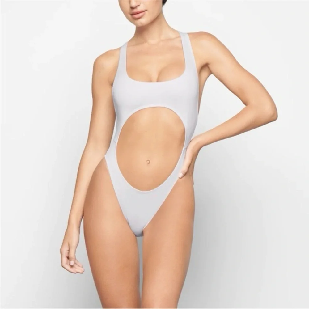 NWT SKIMS off white one piece swimsuit with cutouts Racerback
